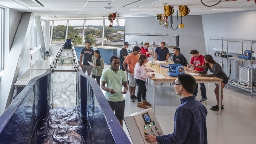Many students working in a water lab.